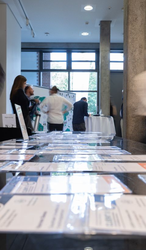 People on the registration counter of an event